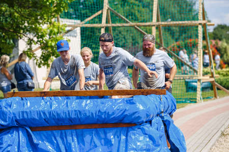 City Plavinas, Latvia. Run race, people were engaged in sports activities. Overcoming various obstacles and running.18.07.2020のeditorial素材