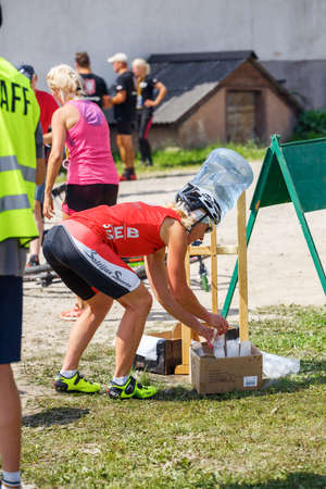 City Plavinas, Latvia. Run race, people were engaged in sports activities. Overcoming various obstacles and running.18.07.2020のeditorial素材