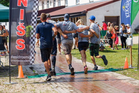 City Plavinas, Latvia. Run race, people were engaged in sports activities. Overcoming various obstacles and running.18.07.2020のeditorial素材