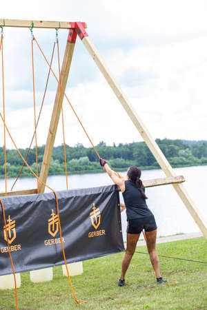City Plavinas, Latvia. Run race, people were engaged in sports activities. Overcoming various obstacles and running.18.07.2020のeditorial素材