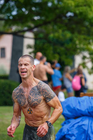 City Plavinas, Latvia. Run race, people were engaged in sports activities. Overcoming various...