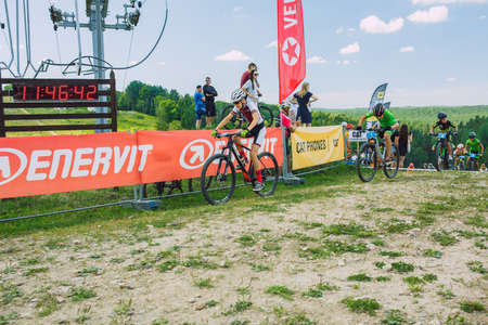 City Cesis, Latvia. Joint cycling mountain ride. A sunny day on the mountain.09.08.2020のeditorial素材