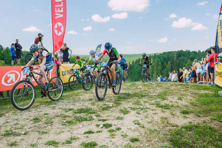 City Cesis, Latvia. Joint cycling mountain ride. A sunny day on the mountain.09.08.2020のeditorial素材