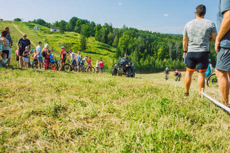 City Cesis, Latvia. Joint cycling mountain ride. A sunny day on the mountain.09.08.2020のeditorial素材