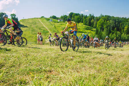 City Cesis, Latvia. Joint cycling mountain ride. A sunny day on the mountain.09.08.2020のeditorial素材