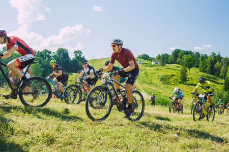 City Cesis, Latvia. Joint cycling mountain ride. A sunny day on the mountain.09.08.2020のeditorial素材