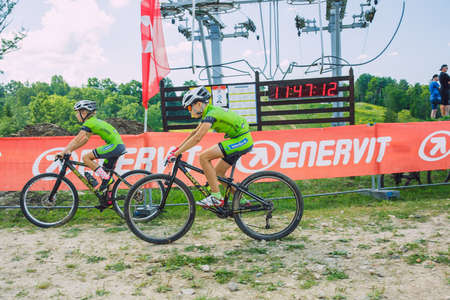 City Cesis, Latvia. Joint cycling mountain ride. A sunny day on the mountain.09.08.2020のeditorial素材