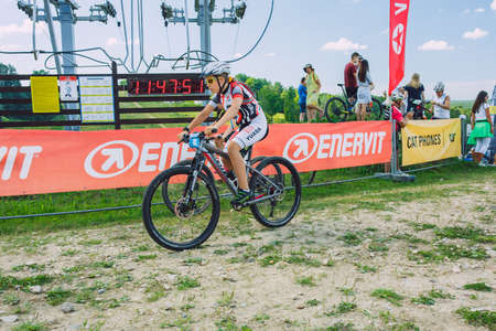 City Cesis, Latvia. Joint cycling mountain ride. A sunny day on the mountain.09.08.2020のeditorial素材