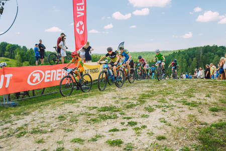 City Cesis, Latvia. Joint cycling mountain ride. A sunny day on the mountain.09.08.2020のeditorial素材