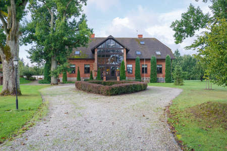 City Talsi, Latvia. Old red brick house and park. Travel photo.05.09.2020のeditorial素材
