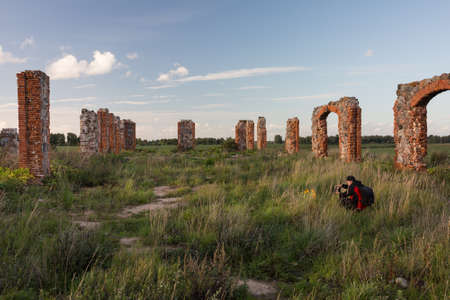 City Smiltene, Latvia.Old brick stonehenge and photographer.Travel photo.の写真素材
