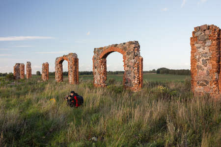 City Smiltene, Latvia.Old brick stonehenge and photographer.Travel photo.の写真素材