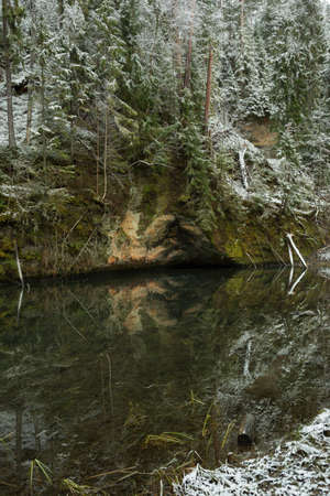 City Cesis, Latvia. Red sand rocks and snow in winter.Travel photo.26.12.2020の写真素材