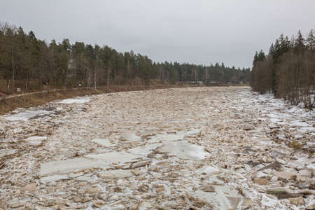 City Ogre, Latvia.Ice flows along the river.Travel photo.13.0.3.2021の写真素材