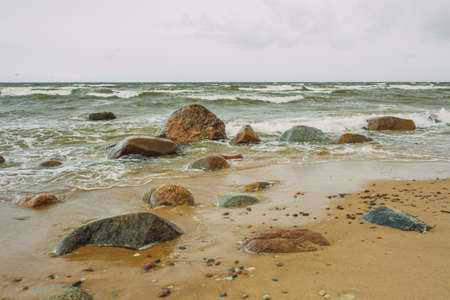 City Tuja, Latvia. Baltic sea beach with sand and rocks. Travel photo 24.04.2021の写真素材