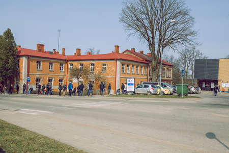 City Cesis, Latvia. covid 19 vaccination line in the open air.17.03.2021のeditorial素材