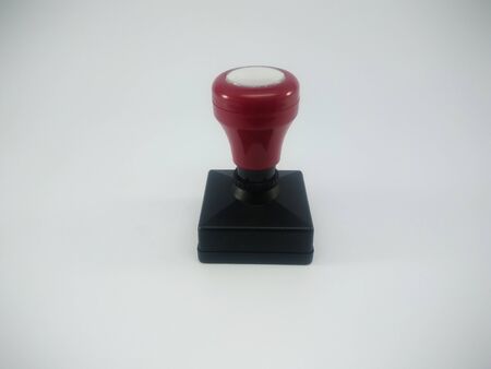 Modern plastic stamp on a white backgroundの写真素材