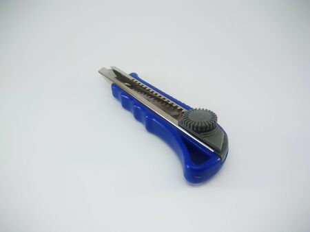 Blue Office Paper Knife Isolated On a White Backgroundの写真素材