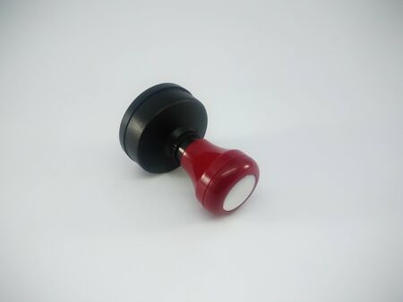 Modern plastic stamp on a white backgroundの写真素材