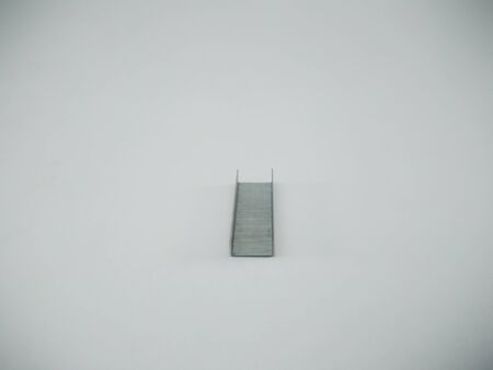 Silver staples clip office stationary equipment isolated on a white backgroundの写真素材