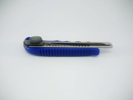 Blue Office Paper Knife Isolated On a White Backgroundの写真素材