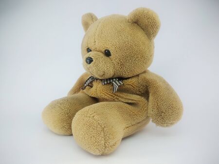 Cute teddy bear doll isolated on a white backgroundの写真素材