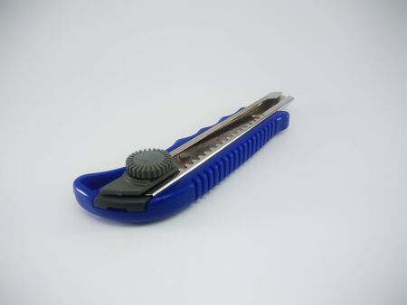 Blue Office Paper Knife Isolated On a White Backgroundの写真素材