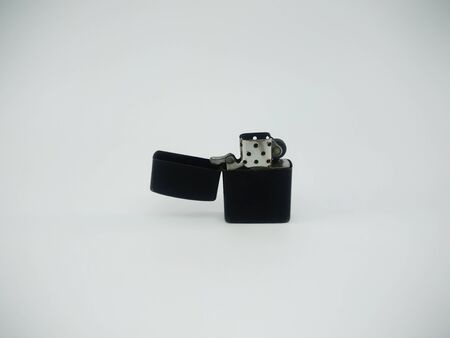 Black metal lighter isolated On a white backgroundの写真素材
