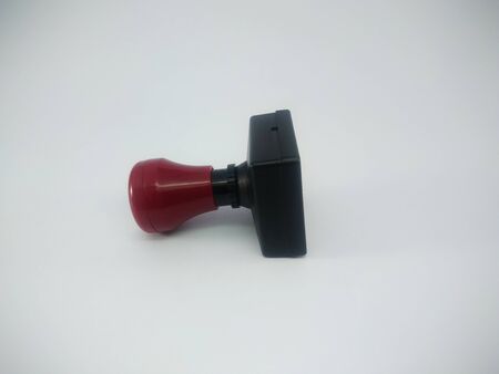Modern plastic stamp on a white backgroundの写真素材