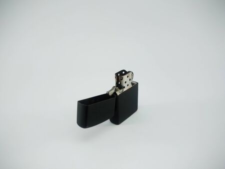 Black metal lighter isolated On a white backgroundの写真素材