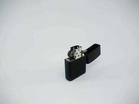 Black metal lighter isolated On a white backgroundの写真素材