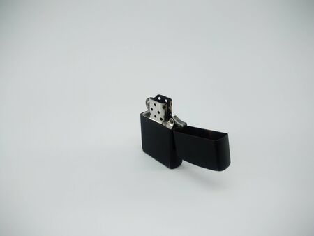 Black metal lighter isolated On a white backgroundの写真素材