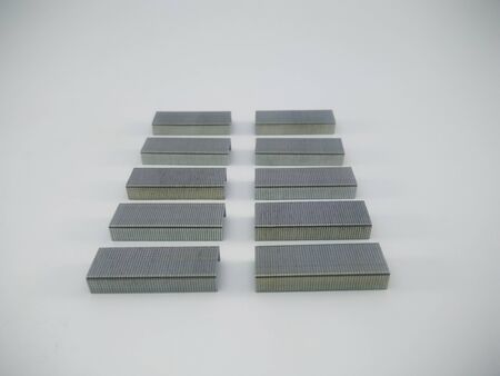 Silver staples clip office stationary equipment isolated on a white backgroundの写真素材