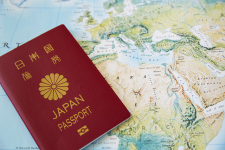 Japanese Passport on the world mapの写真素材