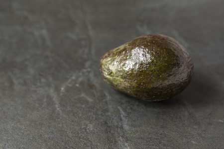Avocado on slate backgroundの写真素材
