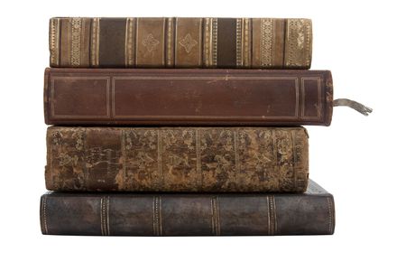 stack of old antique books isolated on a white backgroundの写真素材