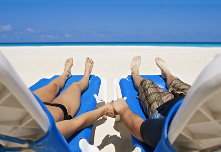 Couple enjoying Peace, love and tranquility on a secluded beachの写真素材