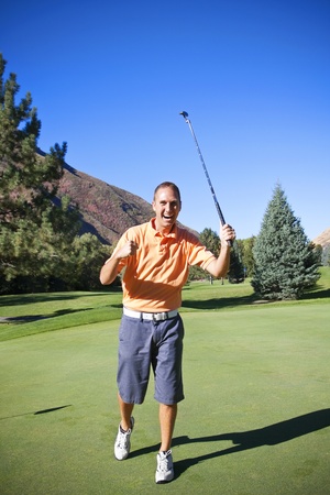 Successful Golfer Making Puttの写真素材