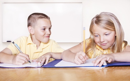 Elementary School Students doing Homeworkの写真素材