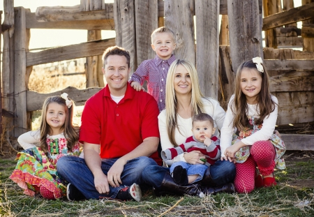 Beautiful Young Family Portrait Outdoorsの写真素材