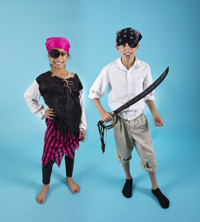 Kids dressed in Halloween Pirate Costumesの写真素材