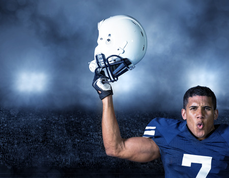 American Football Player celebrating a big winの写真素材