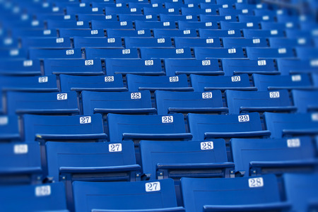 Blue stadium seats selective focusの写真素材