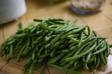 Delicious pile of fresh organic green beans ready to be cookedの写真素材