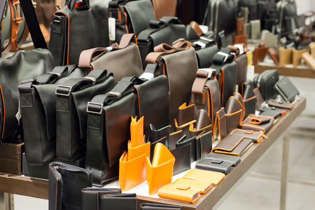 Male leather bags and purses in shopの写真素材