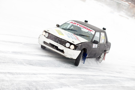 KHABAROVSK, RUSSIA - March 7, 2015: Old car at winter ice track race on frozen riverのeditorial素材