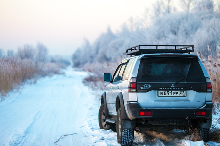KHABEROVSK, RUSSIA - JANUARY 5, 2017: Mitsubishi Pajero Sport on a winrer road in early morningのeditorial素材