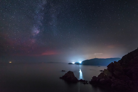 Milky way over the sea. Some noise from high iso existsの写真素材