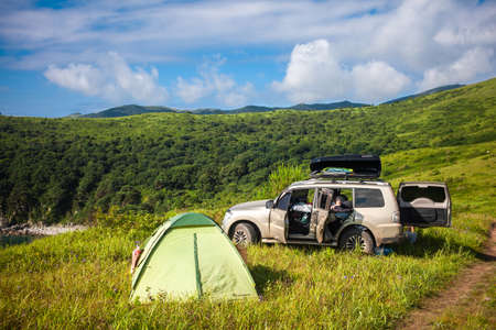 Vityaz, Russia - July 26, 2021: SUV. Tent. Camping