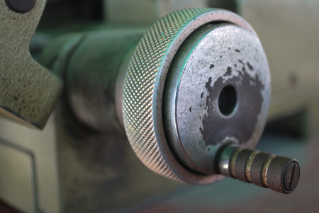The handle of the small metal cutter serves to move the metal toward the metal cutting blade.